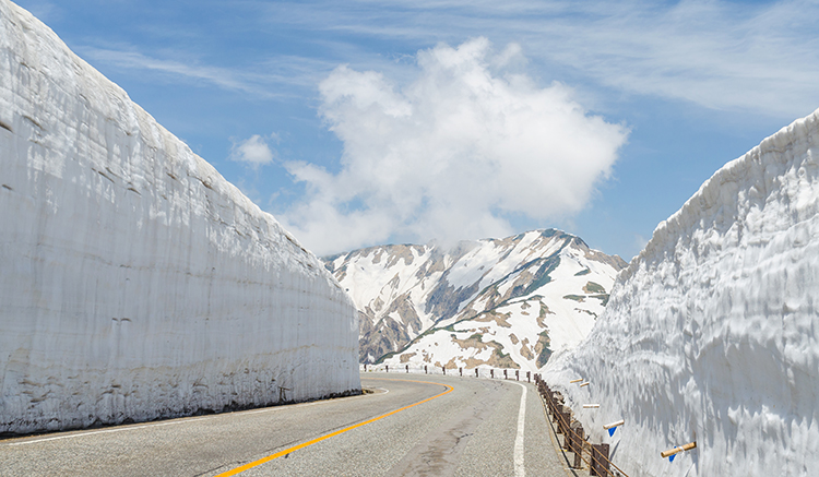 Empty road and snow wall at japan alps tateyama kurobe alpine route
